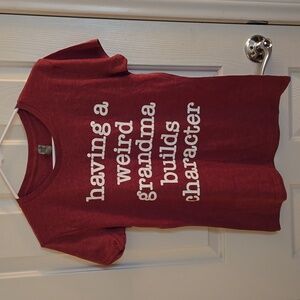 NWOT Women's T-Shirt. "Having a weird grandma builds character" Size Small.